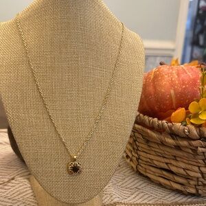 Elegant Gold Necklace with Black Stone Pendant